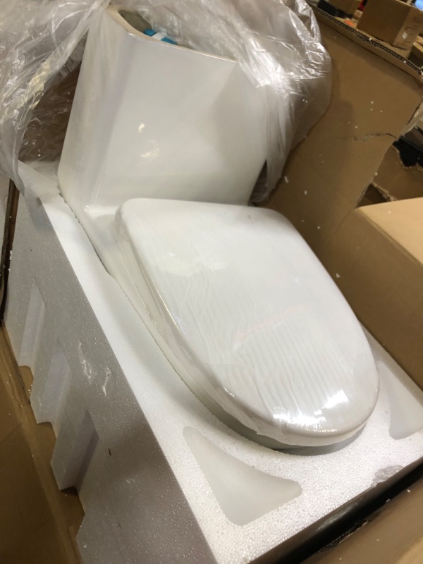 Photo 1 of Swiss Madison SM-1T257 Sublime II Compact 24" Length One Piece Toilet Dual Flush 1.1/1.6 GPF with Side Holes, Glossy White Dual Flush Compact Glossy White