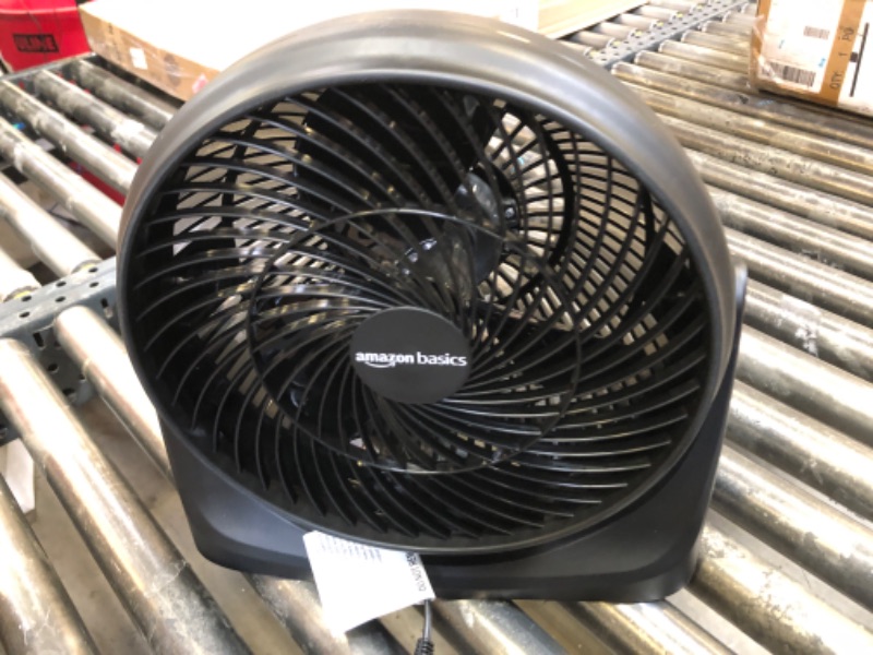 Photo 1 of Amazon Basics 15-Inch Air Circulator Fan with 90-Degree Tilt Head and 3 Speed Settings, 70 Watts, Ultra Quiet (30 dB), Lightweight (4 LBS), Black, 7.6"D x 14.8"W x 14.1"H