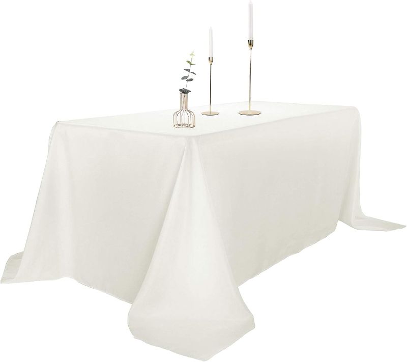 Photo 1 of  90x132 Inch Ivory Rectangular Tablecloth 8 Feet Table Cloth in Polyester Fabric for Wedding/Banquet/Restaurant/Parties