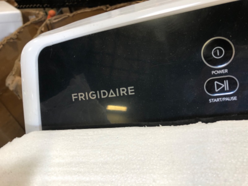 Photo 1 of Frigidaire FFTW4120SW 4.1 cu. ft. High Efficiency Top Load Washer, 12 wash cycles, Quick Wash, Delicate, Hand Wash, Active Wear, Heavy Duty, Stainless Steel Drum, in White
TURNS ON BUT UNABLE TO TEST 
DENTED ON SIDE 