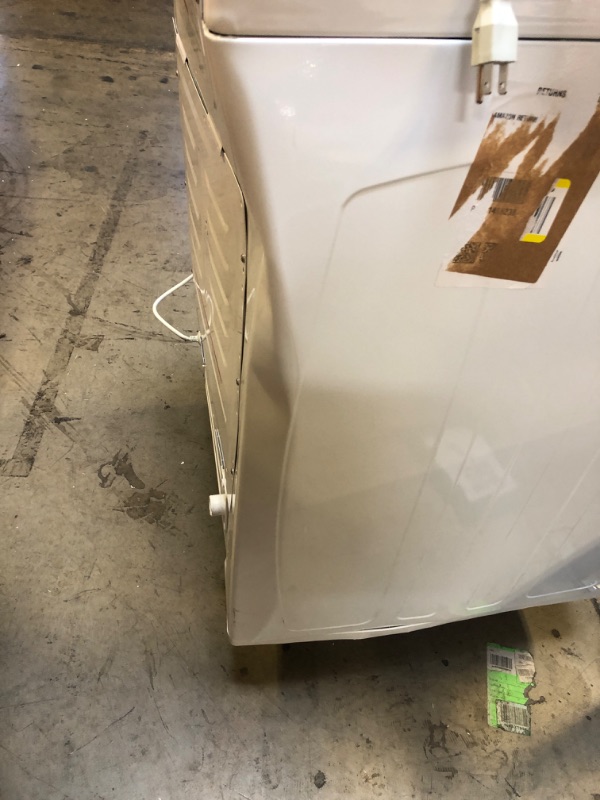 Photo 1 of Frigidaire FFTW4120SW 4.1 cu. ft. High Efficiency Top Load Washer, 12 wash cycles, Quick Wash, Delicate, Hand Wash, Active Wear, Heavy Duty, Stainless Steel Drum, in White
TURNS ON BUT UNABLE TO TEST 
DENTED ON SIDE 