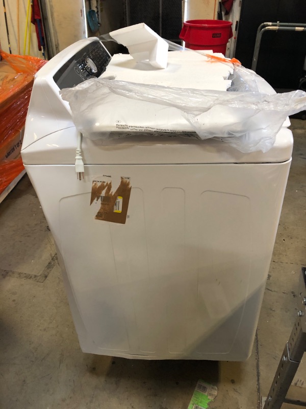 Photo 1 of Frigidaire FFTW4120SW 4.1 cu. ft. High Efficiency Top Load Washer, 12 wash cycles, Quick Wash, Delicate, Hand Wash, Active Wear, Heavy Duty, Stainless Steel Drum, in White
TURNS ON BUT UNABLE TO TEST 
DENTED ON SIDE 