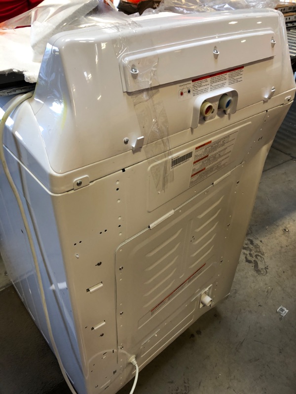Photo 1 of Frigidaire FFTW4120SW 4.1 cu. ft. High Efficiency Top Load Washer, 12 wash cycles, Quick Wash, Delicate, Hand Wash, Active Wear, Heavy Duty, Stainless Steel Drum, in White
TURNS ON BUT UNABLE TO TEST 
DENTED ON SIDE 