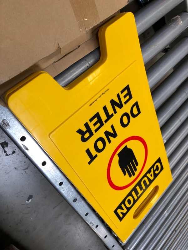 Photo 1 of SmartSign Folding Floor Sign, Legend "Do Not Enter" with Graphic, 25" high x 12" wide, Black/Red on Yellow