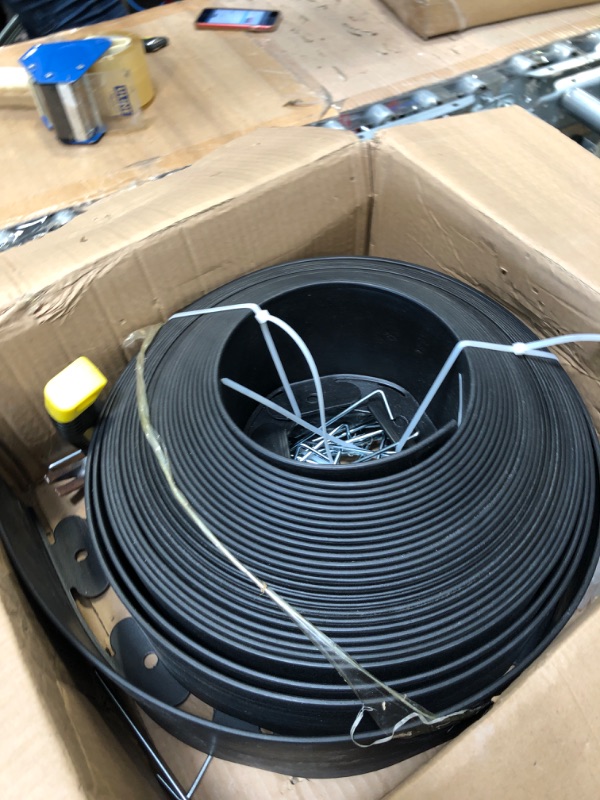 Photo 1 of ****USED*** GROWNEER 4 in Tall, 66FT No-Dig Landscape Edging, Rubberific Landscape Edging Garden Edging Border with 60 Pcs Garden Staples, 1PC Hammer Edging for Landscaping Garden, Flower Beds, and Lawn (Black) Black 66 FT x 4 IN