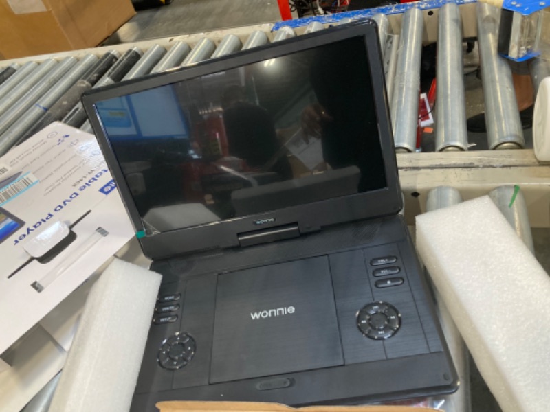 Photo 3 of ****USED**PARTS ONLY***SOLD AS IS**ALL SALES ARE FINAL** WILL NOT TURN ON** WONNIE 16.5" Portable DVD Player with 14.1" Large HD Swivel Screen, 6 Hours Rechargeable Battery, High Clear Volume Speaker, Support USB/SD Card/Sync TV, Last Memory and Multiple 