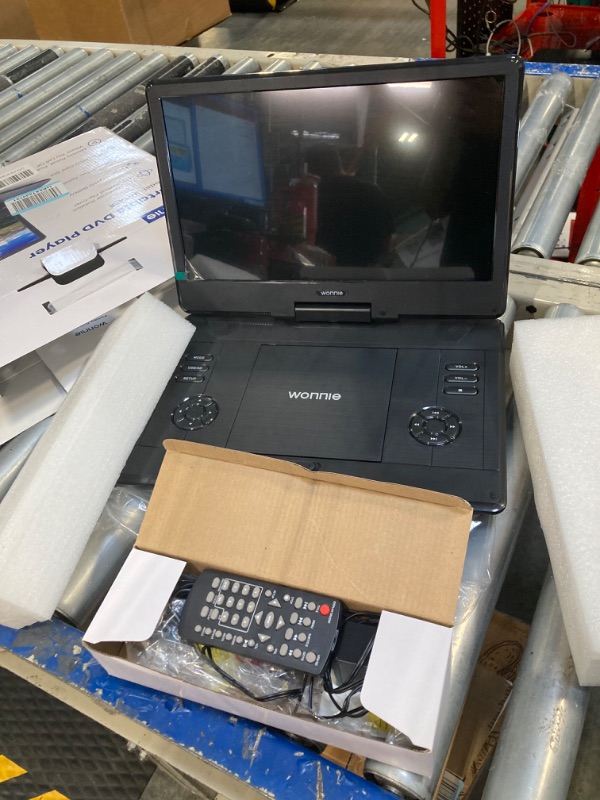 Photo 4 of ****USED**PARTS ONLY***SOLD AS IS**ALL SALES ARE FINAL** WILL NOT TURN ON** WONNIE 16.5" Portable DVD Player with 14.1" Large HD Swivel Screen, 6 Hours Rechargeable Battery, High Clear Volume Speaker, Support USB/SD Card/Sync TV, Last Memory and Multiple 