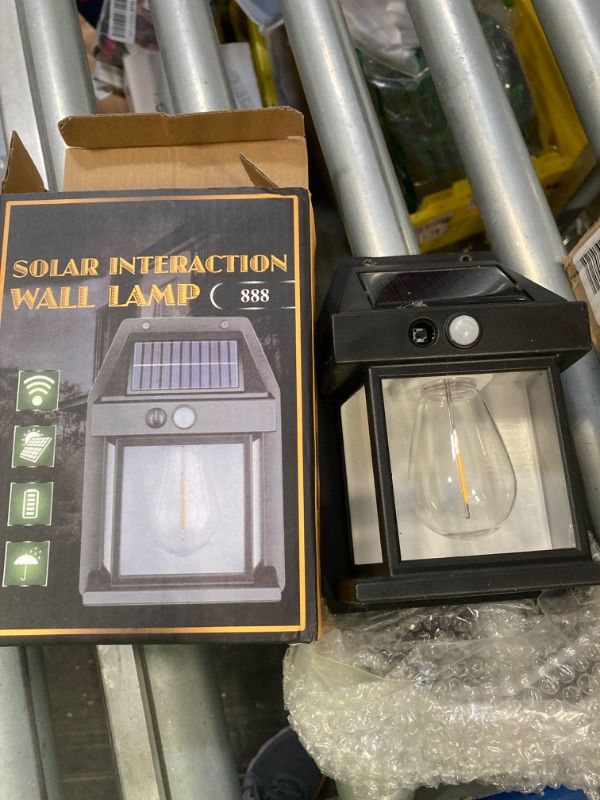 Photo 2 of ****USED** Solar Lights Outdoor, Dusk to Dawn Solar Wall Sconce Motion Sensor, 3 Lighting Modes Waterproof Solar Security Wall Lantern Light Fixtures for Garden Yard Patio Fence Outside Decorative 1PCS