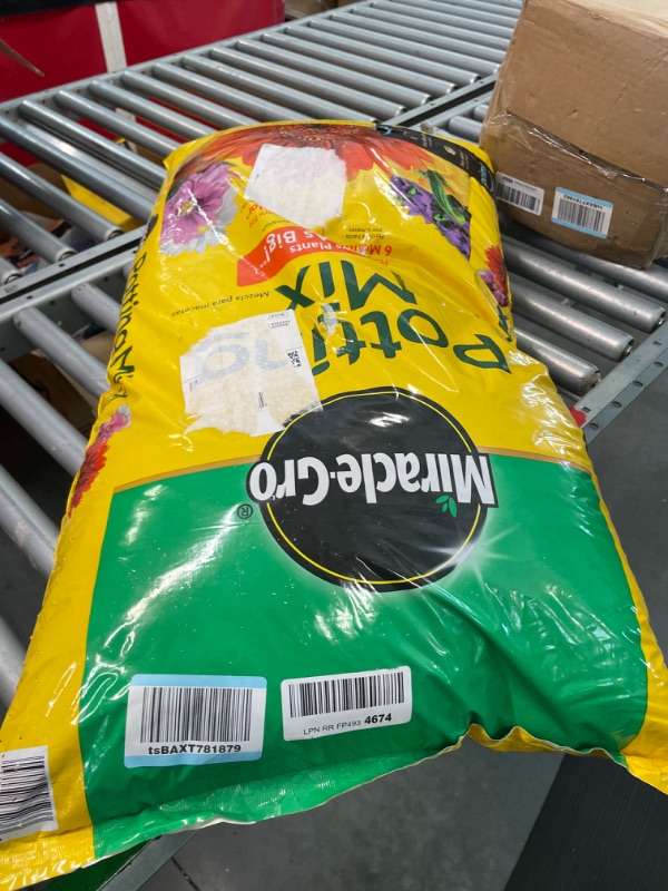Photo 1 of ****USED** Miracle-Gro Potting Mix, 2 cu. ft.