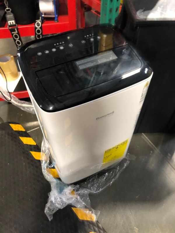 Photo 5 of ****USED***PARTS ONLY***SOLD AS IS NO RETURNS***ALL SALES ARE FINAL*** Honeywell 13,000 BTU Smart WiFi Portable Air Conditioner for Bedroom, Basement, Living Room, 115V, Cools Rooms Up to 625 Sq. Ft, Dehumidifier with Alexa Voice Control, Remote, 24H Time