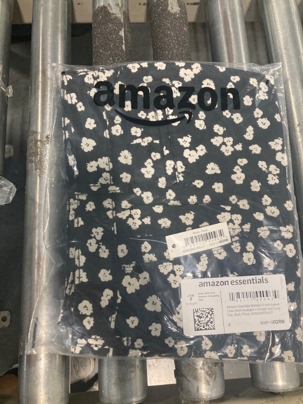 Photo 2 of ****USED** Amazon Essentials Women's Mid-Rise Slim-Fit 5 Inch Inseam Khaki Short (Available in Straight and Curvy Fits), Black White Floral, 4