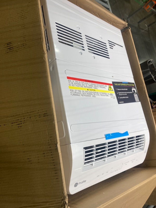 Photo 4 of ****USED***AC UNIT NOT GETTING COLD**** GE Profile ClearView Inverter Window Air Conditioner Unit, 12,200 BTU,115 Volt,U-Shaped Adjustable Depth,Energy Efficient Cooling up to 550 sq ft.,Ultra Quiet, SMART Home Capable,Includes Remote,White 12200 BTU Inve