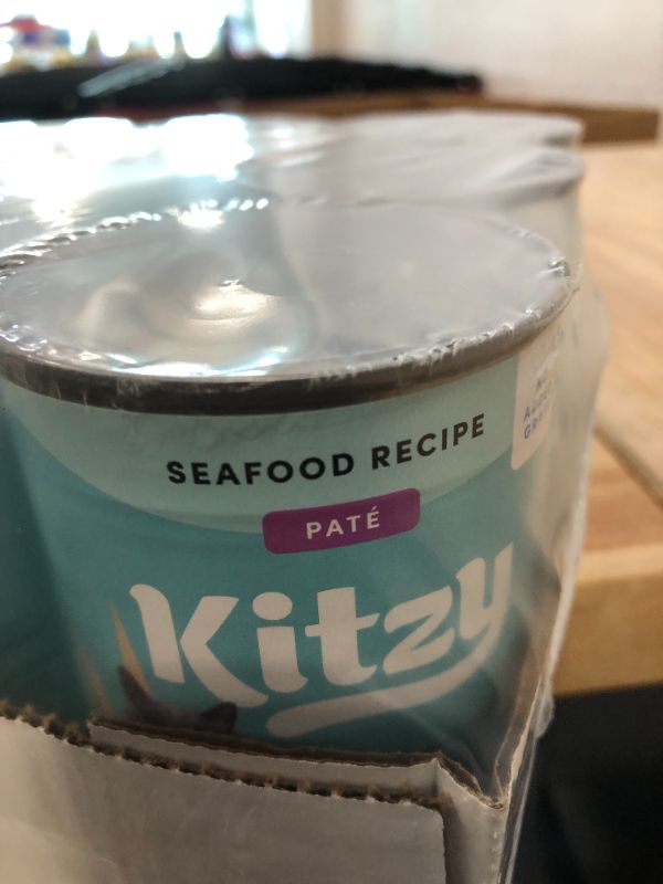 Photo 1 of Amazon Brand - Kitzy Wet Cat Food, Paté, No Added Grain, Seafood Recipe, 12.5 oz cans, Pack of 12 EXP : 9/16/24