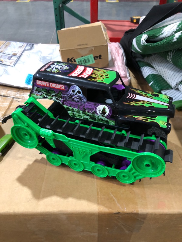 Photo 2 of (READ FULL POST) Monster Jam, Official Grave Digger Trax All-Terrain Remote Control Outdoor Vehicle, 1:15 Scale, Kids Toys for Boys and Girls Ages 4-6+ Grave Digger 1:15 Rc (Trax)