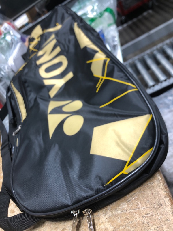 Photo 2 of ** 2.5" CUT ON KITBAG**
YONEX Badminton Kitbag BT5 | 2 Zipper Compartment for Storage of 3 Rackets and Clothes| 23015 Black Gold