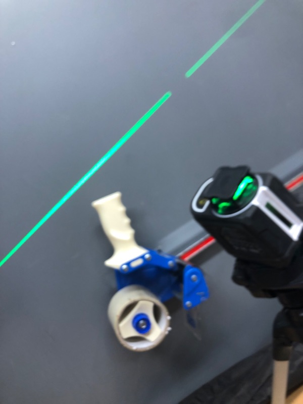 Photo 2 of **button that latches laser onto tripod is missing***
Firecore 360° Laser Level with Tripod, Green Self Leveling Cross Line Laser Tool with 3 Brightness Adjustment Pulse Mode for Floor Tile Wall Construction, L-Bracket, Batteries & Carry Pouch Included
