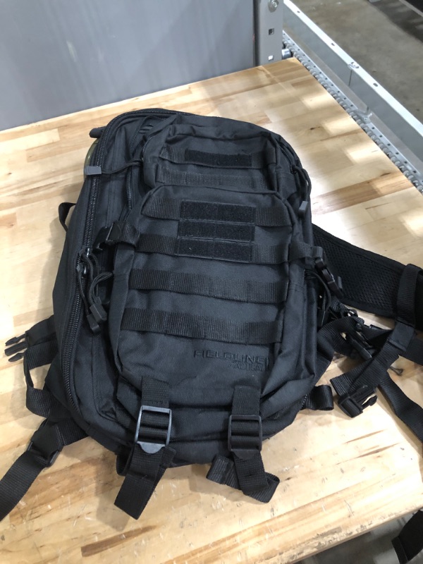 Photo 1 of Surge Tactical Hydration Pack by Fieldline | Military Backpack with MOLLE System | Survival Bug Out Bag | 22L Storage Capacity + 3L Reservoir Black