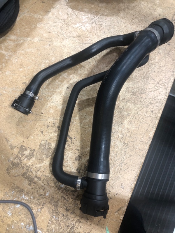 Photo 2 of **CAR COMPATABILITY UNKNOWN**
 Upper Radiator Coolant Hose
