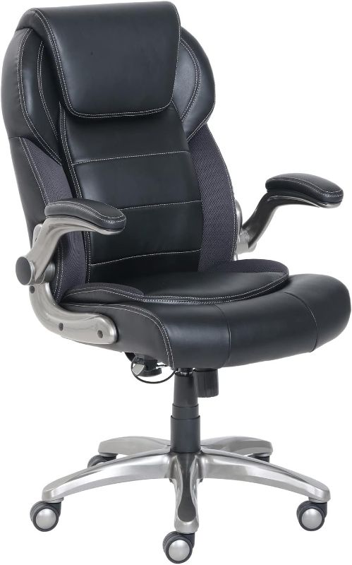 Photo 1 of Amazon Basics Ergonomic High-Back Bonded Leather Executive Chair with Flip-Up Arms and Lumbar Support, Black (Previously AmazonCommercial brand)
