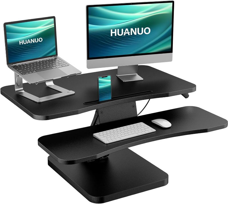 Photo 1 of 
HUANUO 32 Inch Height Adjustable Standing Desk Converter, Sit Stand up Desk Riser with Wide Keyboard Tray for Home Office, Laptop, Dual Monitor Computer...