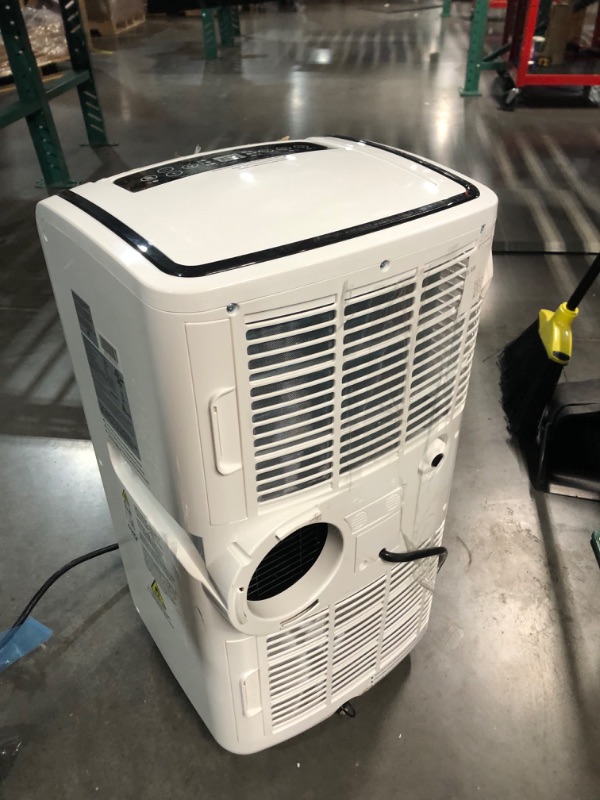 Photo 8 of ***USED - DIRTY - POWERS ON - NO PACKAGING - SEE PICTURES***
Honeywell 9,000 BTU Portable Air Conditioner for Bedroom, Living Room, Apartment, 115V, Cools Rooms Up to 400 Sq. Ft. with Dehumidifier & Fan, 24-hour Timer, Remote, White/Black Up to 400 Sq. Ft