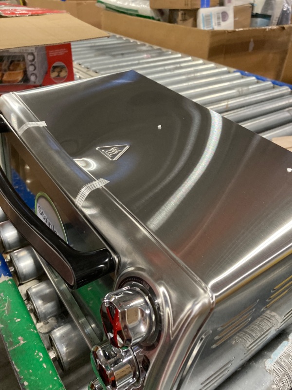 Photo 1 of Hamilton Beach 4-Slice Countertop Toaster Oven with Bake Pan, Stainless Steel (31143)
***Dented on the top*** 