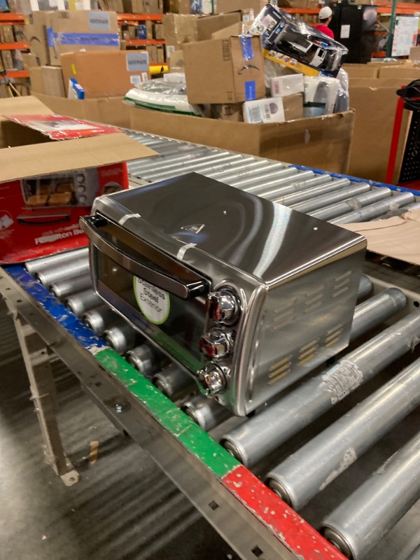 Photo 1 of Hamilton Beach 4-Slice Countertop Toaster Oven with Bake Pan, Stainless Steel (31143)
***Dented on the top*** 