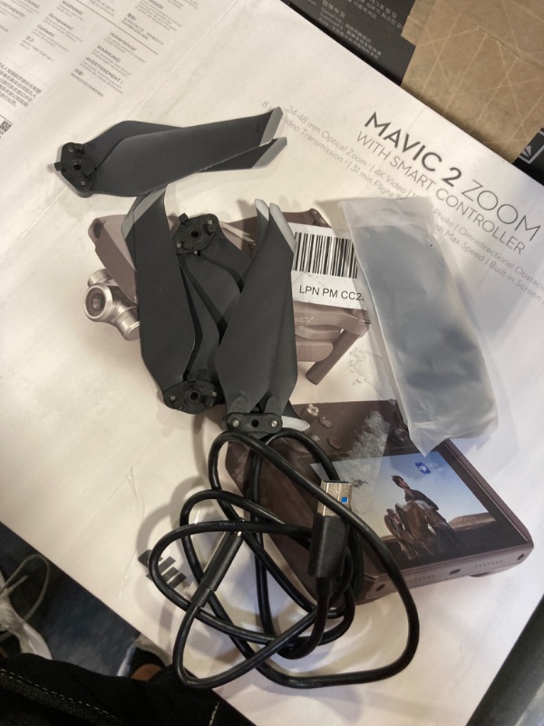 Photo 1 of DJI Mavic 2 Zoom - Drone Quadcopter UAV with Smart Controller Optical Zoom Camera 3-Axis Gimbal 4K Video UAV 12MP 1/2.3" CMOS Sensor, up to 48mph, Gray
***Used, but in fair condition*** 