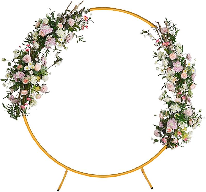 Photo 1 of  Round Backdrop Stand,Golden Metal Wedding Balloon Arch for Party Wedding Birthday Baby Shower Garden Backdrop Decoration
***Size unknown, Stock photo is a  similar item*** 