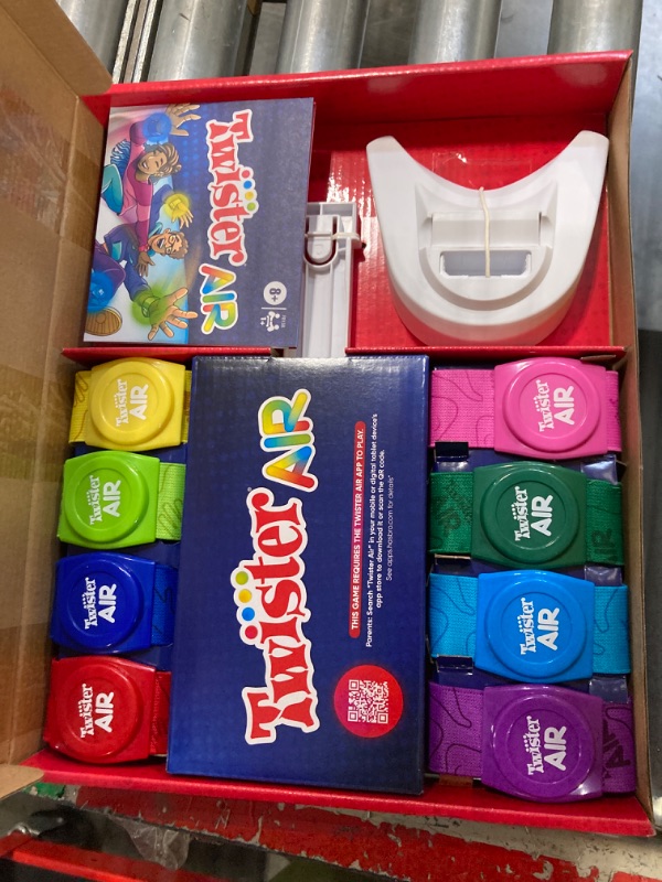 Photo 3 of Hasbro Gaming Twister Air Game | AR App Play Game with Wrist and Ankle Bands | Links to Smart Devices | Active Party Games for Kids and Adults | Ages 8+ | for 1+ Players