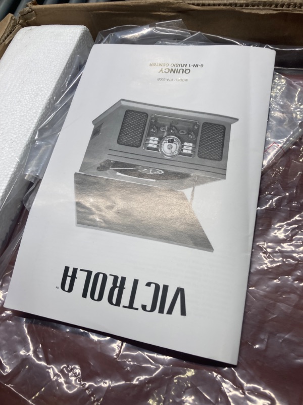 Photo 3 of *** NOT FUNCTIONAL**** SELLING AS PARTS***
Victrola Nostalgic 6-in-1 Bluetooth Record Player & Multimedia Center with Built-in Speakers - 3-Speed Turntable, CD & Cassette Player, FM Radio | Wireless Music Streaming | Mahogany Mahogany Entertainment Center
