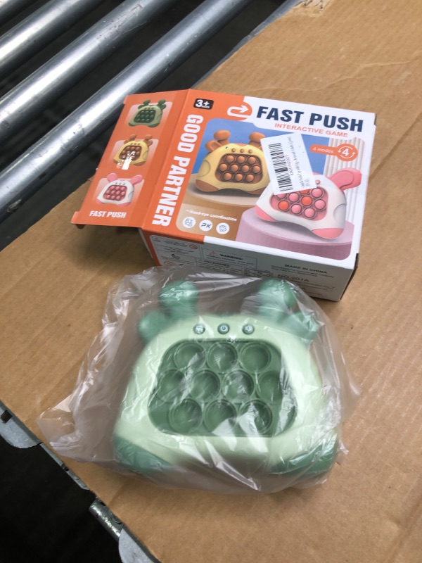 Photo 1 of Quick Push Toy with Lights, Fast Push Game, Fast Push Bubble Game, Children's Decompression Breakthrough Puzzle Game Machine for Kids, Children and Adults (Green)