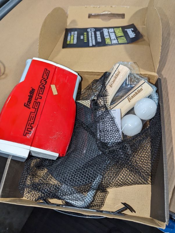 Photo 1 of Franklin Sports Table Tennis to Go Portable Ping Pong Set - Table Top Ping Pong Net + (2) Paddles - Ping Pong Balls Included - 2 Players Red
