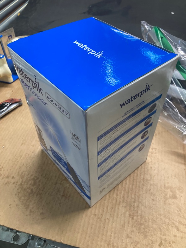 Photo 1 of Waterpik Aquarius Water Flosser Professional For Teeth, Gums, Braces, Dental Care, Electric Power With 10 Settings, 7 Tips For Multiple Users And Needs, ADA Accepted, Gray WP-667CD