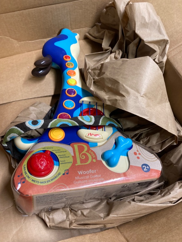 Photo 1 of B. toys- Woofer- Interactive Dog Guitar- Musical Toys- 3 Music Modes- Big & Colorful Buttons – 2 Years +