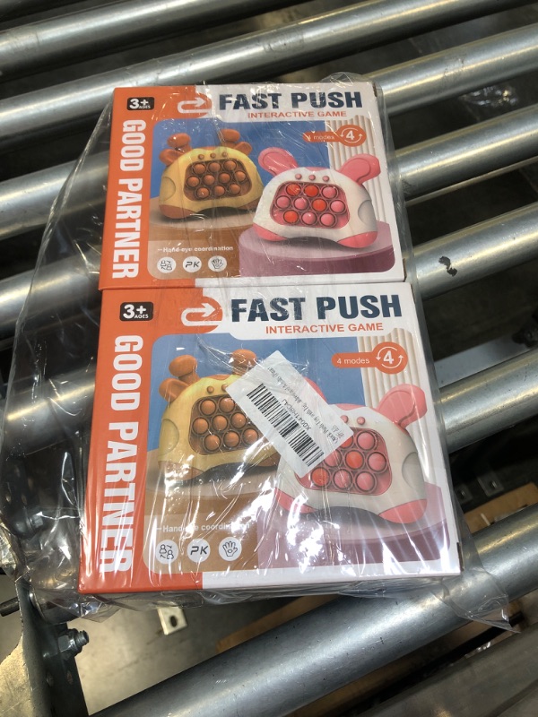 Photo 1 of Quick Push Toy with Lights, Fast Push Game, Fast Push Bubble Game, Children's Decompression Breakthrough Puzzle Game Machine for Kids, Children and Adults (Pink)