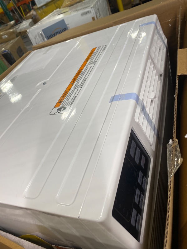 Photo 4 of ****USED*** Whirlpool WHAT102-HAW 10,000 230V Air Conditioner with Supplemental Heat, Dehumidifier and Remote, Wall AC Unit for Apartment, Living Medium Rooms up to 450 Square Feet in White, 10000 BTU 10000 BTU Heat/Cool 230V White