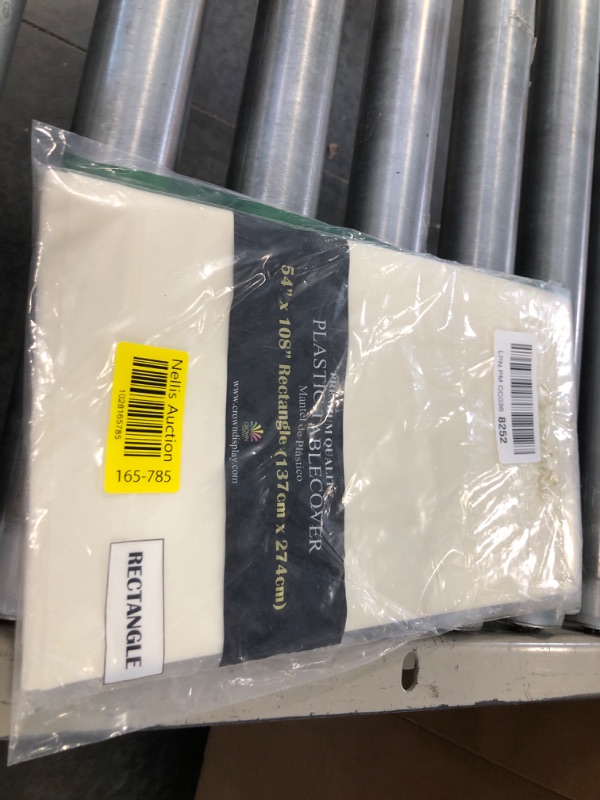 Photo 1 of *Premium* Ivory Table cover 54" x 108"