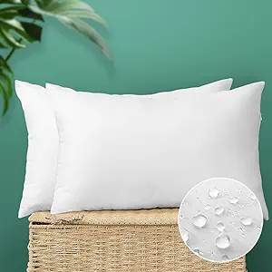 Photo 1 of OTOSTAR Outdoor Throw Pillow Inserts - Pack of 2 Water Resistant Cushion Inner Pads for Patio Garden Coffee House Decorative Waterproof Pillow Inserts 12x20 Inch -White