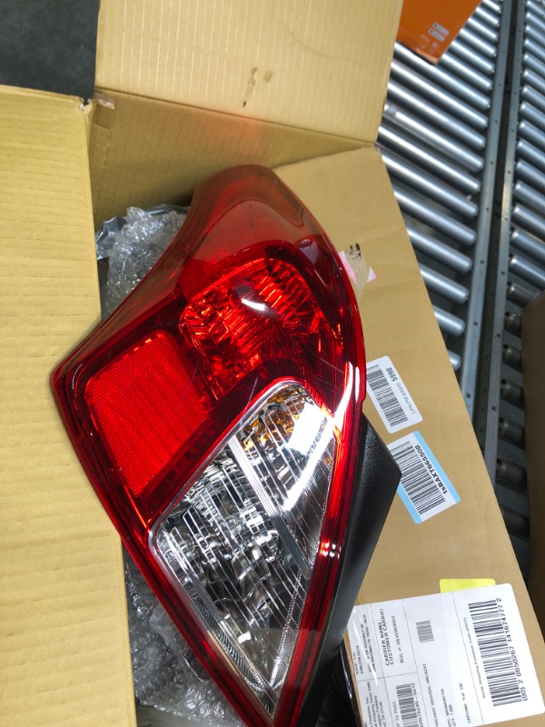 Photo 3 of Dorman 1571431 Driver Side Tail Light Assembly Compatible with Select Nissan Models