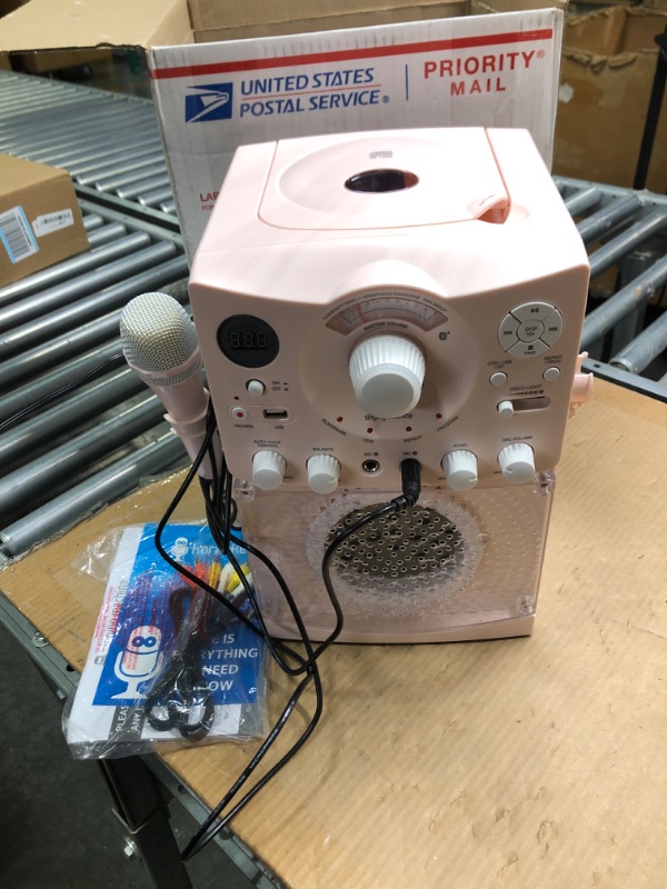 Photo 3 of *** NOT FUNCTIONAL**** SELLING AS PARTS***
Singing Machine Portable Karaoke Machine for Adults & Kids with Wired Microphone, Rose Gold/Frosted Pink - Built-In Karaoke Speaker, Bluetooth with LED Disco Lights - Karaoke System with CD+G & USB