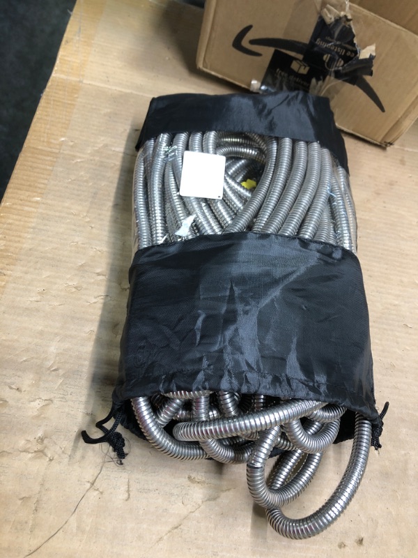 Photo 1 of Garden Hose 50ft, Stainless Steel Heavy Duty Water Hose with 10 Function Nozzle Flexible, Lightweight, Kink Free, Pet Proof, Puncture Proof Hose Metal for Yard, Outdoor