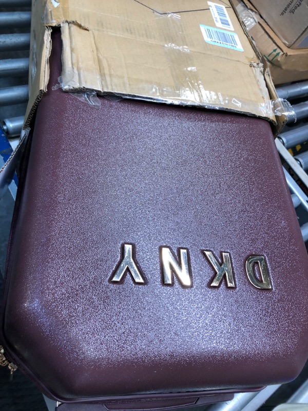 Photo 4 of *** MAJOR DAMAGED******FOR PARTS ONLY NO RETURNS***
DKNY Luggage Upright with 8 Spinner Wheels, ABS+PC Case, Weekend Bag, Burgundy, 21" Carry On