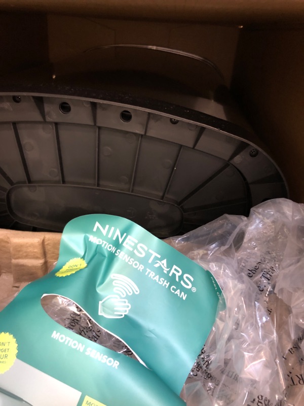 Photo 3 of ****USED***BOTTOM OF TRASH CAN IS DAMAGED**** NINESTARS DZT-50-13 Automatic Touchless Motion Sensor Oval Trash Can with Black Top, 13 gallon/50 L, Stainless Steel