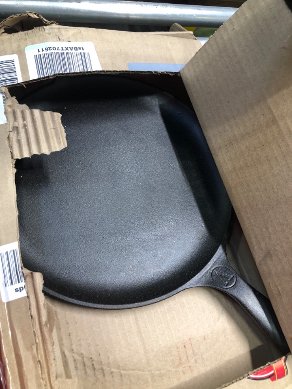 Photo 3 of **VERY USED** Victoria 12-Inch Cast Iron Comal Pizza Pan with a Long Handle and a Loop Handle, Preseasoned with Flaxseed Oil, Made in Colombia
