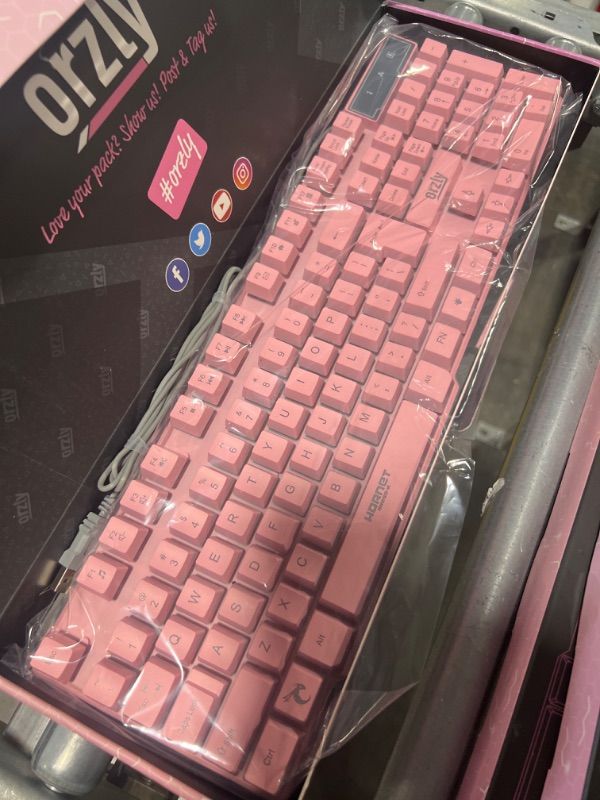 Photo 1 of Orzly Pink Gaming Keyboard RGB USB Wired Rainbow Keyboard Designed for PC Gamers, PS4, PS5, Laptop, Xbox, Nintendo Switch, RX-250 Hornet Edition