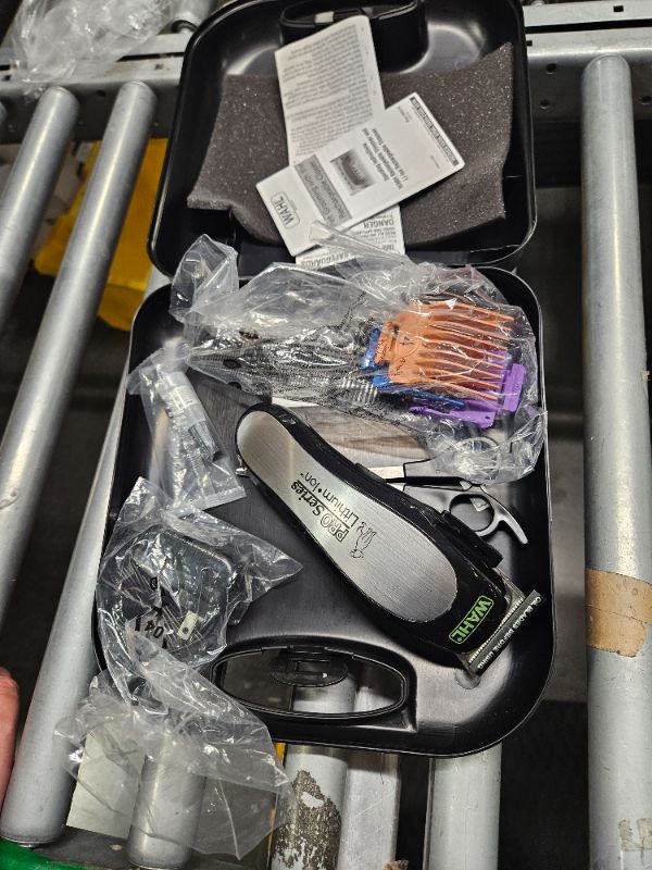 Photo 1 of **GOOD USED**Wahl Lithium Ion Pro Series Cordless Animal Clippers – Rechargeable, Heavy-Duty, Electric Dog & Cat Grooming Kit for Small & Large Breeds with Thick to Heavy Coats – Model 9766