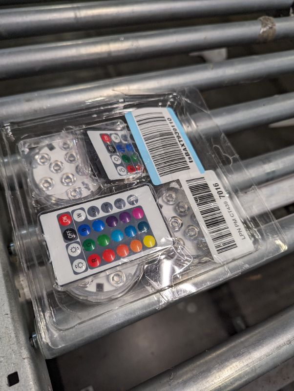 Photo 1 of Submersible Led Lights Battery Operated Spot Lights with Remote Small Lamps Decorative Fish Bowl Light Remote Controlled Small Led Lights for Aquarium Vase Base Pond Wedding Halloween Party (4 Pack) 10 LEDs