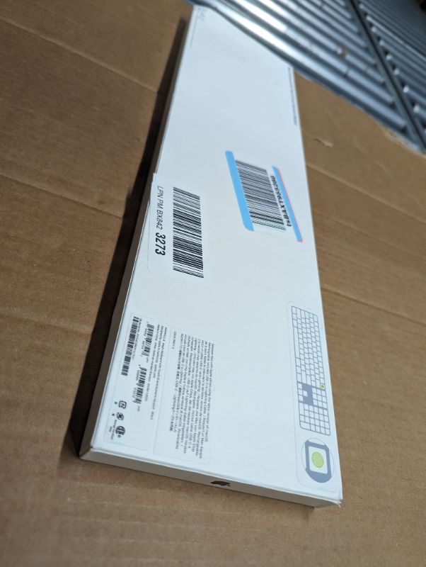 Photo 1 of Magic Keyboard with Touch ID and Numeric Keypad for Mac Models with Apple Silicon - Silver/Black