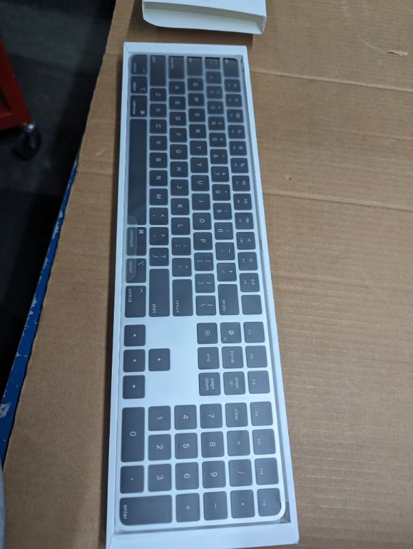 Photo 1 of Magic Keyboard with Touch ID and Numeric Keypad for Mac Models with Apple Silicon - Silver/Black